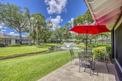 Located in the highly desirable Club Cottages community within on PGA National Golf Club in Florida - for sale on GolfHomes.com, golf home, golf lot