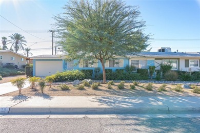 Inviting 55+ end-unit home located in the heart of Menifee on Cherry Hills Golf Club in California - for sale on GolfHomes.com, golf home, golf lot