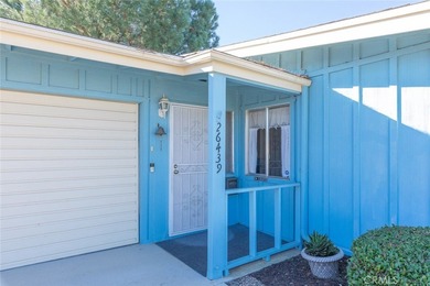 Inviting 55+ end-unit home located in the heart of Menifee on Cherry Hills Golf Club in California - for sale on GolfHomes.com, golf home, golf lot