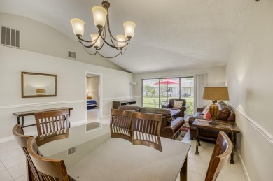 Located in the highly desirable Club Cottages community within on PGA National Golf Club in Florida - for sale on GolfHomes.com, golf home, golf lot