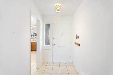 Inviting 55+ end-unit home located in the heart of Menifee on Cherry Hills Golf Club in California - for sale on GolfHomes.com, golf home, golf lot