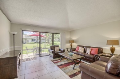 Located in the highly desirable Club Cottages community within on PGA National Golf Club in Florida - for sale on GolfHomes.com, golf home, golf lot