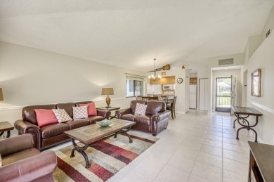 Located in the highly desirable Club Cottages community within on PGA National Golf Club in Florida - for sale on GolfHomes.com, golf home, golf lot