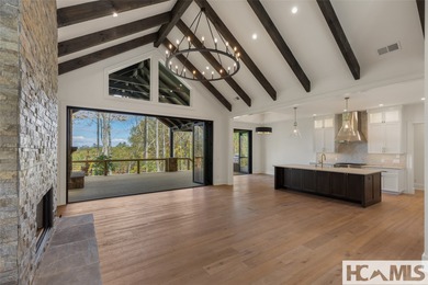 Nestled within the gates of Wildcat Cliffs Country Club but part on Wildcat Cliffs Country Club in North Carolina - for sale on GolfHomes.com, golf home, golf lot