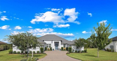 Welcome Home to this beautifully expanded Royal Palm in the on Harbor Hills Country Club in Florida - for sale on GolfHomes.com, golf home, golf lot