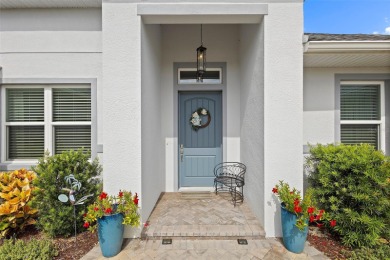 Welcome Home to this beautifully expanded Royal Palm in the on Harbor Hills Country Club in Florida - for sale on GolfHomes.com, golf home, golf lot
