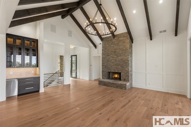 Nestled within the gates of Wildcat Cliffs Country Club but part on Wildcat Cliffs Country Club in North Carolina - for sale on GolfHomes.com, golf home, golf lot