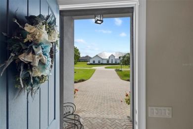 Welcome Home to this beautifully expanded Royal Palm in the on Harbor Hills Country Club in Florida - for sale on GolfHomes.com, golf home, golf lot