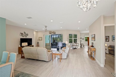 Welcome Home to this beautifully expanded Royal Palm in the on Harbor Hills Country Club in Florida - for sale on GolfHomes.com, golf home, golf lot