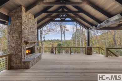 Nestled within the gates of Wildcat Cliffs Country Club but part on Wildcat Cliffs Country Club in North Carolina - for sale on GolfHomes.com, golf home, golf lot