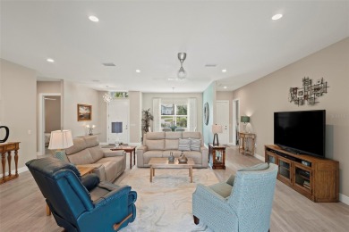 Welcome Home to this beautifully expanded Royal Palm in the on Harbor Hills Country Club in Florida - for sale on GolfHomes.com, golf home, golf lot