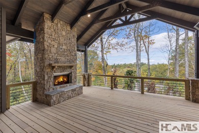 Nestled within the gates of Wildcat Cliffs Country Club but part on Wildcat Cliffs Country Club in North Carolina - for sale on GolfHomes.com, golf home, golf lot