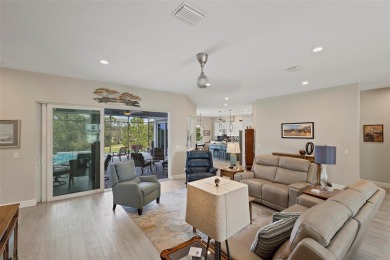 Welcome Home to this beautifully expanded Royal Palm in the on Harbor Hills Country Club in Florida - for sale on GolfHomes.com, golf home, golf lot