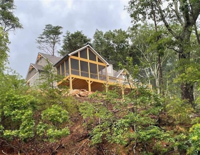 Welcome to this Mountain retreat situated on an over-sized lot on The Highlands Course at Lake Arrowhead in Georgia - for sale on GolfHomes.com, golf home, golf lot