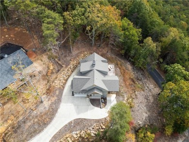 Welcome to this Mountain retreat situated on an over-sized lot on The Highlands Course at Lake Arrowhead in Georgia - for sale on GolfHomes.com, golf home, golf lot