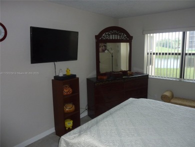 Stunning 1 bed, 1.5 bath, 1st-floor unit in 55+ community! on Sunrise Lakes Phase IV Golf Course in Florida - for sale on GolfHomes.com, golf home, golf lot