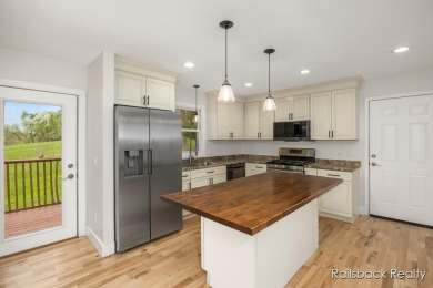 Do not miss this amazing Comstock Park property located on the on Alpine Golf Club in Michigan - for sale on GolfHomes.com, golf home, golf lot