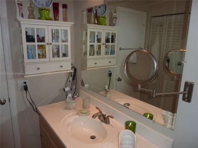 Stunning 1 bed, 1.5 bath, 1st-floor unit in 55+ community! on Sunrise Lakes Phase IV Golf Course in Florida - for sale on GolfHomes.com, golf home, golf lot