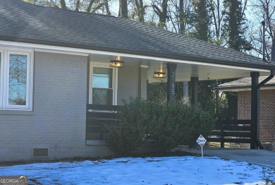 Welcome to this charming 3-bedroom, 2-bath home in the heart of on Charlie Yates Golf Course in Georgia - for sale on GolfHomes.com, golf home, golf lot