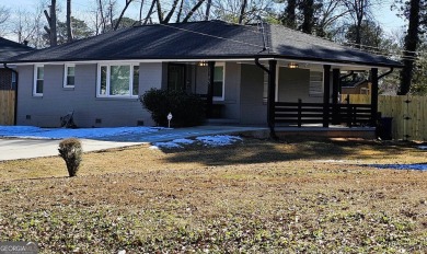 Welcome to this charming 3-bedroom, 2-bath home in the heart of on Charlie Yates Golf Course in Georgia - for sale on GolfHomes.com, golf home, golf lot