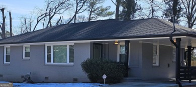 Welcome to this charming 3-bedroom, 2-bath home in the heart of on Charlie Yates Golf Course in Georgia - for sale on GolfHomes.com, golf home, golf lot