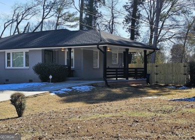 Welcome to this charming 3-bedroom, 2-bath home in the heart of on Charlie Yates Golf Course in Georgia - for sale on GolfHomes.com, golf home, golf lot