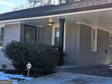 Welcome to this charming 3-bedroom, 2-bath home in the heart of on Charlie Yates Golf Course in Georgia - for sale on GolfHomes.com, golf home, golf lot