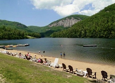 Lot 66 in Holly Forest offers access to the premier amenities of on Sapphire National Golf Club in North Carolina - for sale on GolfHomes.com, golf home, golf lot