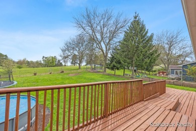 Do not miss this amazing Comstock Park property located on the on Alpine Golf Club in Michigan - for sale on GolfHomes.com, golf home, golf lot