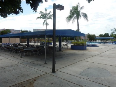 Stunning 1 bed, 1.5 bath, 1st-floor unit in 55+ community! on Sunrise Lakes Phase IV Golf Course in Florida - for sale on GolfHomes.com, golf home, golf lot
