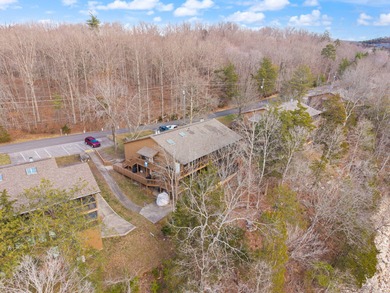 Exquisite year round Lakeview upper level condo located in on Woodson Bend Resort in Kentucky - for sale on GolfHomes.com, golf home, golf lot