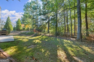 This meticulously renovated 4-sided brick ranch home combines on Royal Lakes Golf and Country Club in Georgia - for sale on GolfHomes.com, golf home, golf lot