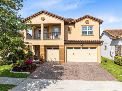 This stunning 5-bed, 5-bath Jones Homes masterpiece with water on Eagle Creek Golf Club in Florida - for sale on GolfHomes.com, golf home, golf lot
