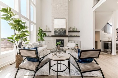 This is a MODEL HOME.  You will want to see this gorgeous brand on Heritage Park Golf Course in Kansas - for sale on GolfHomes.com, golf home, golf lot