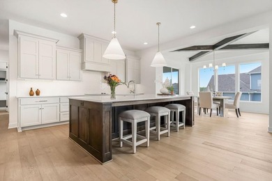 This is a MODEL HOME.  You will want to see this gorgeous brand on Heritage Park Golf Course in Kansas - for sale on GolfHomes.com, golf home, golf lot