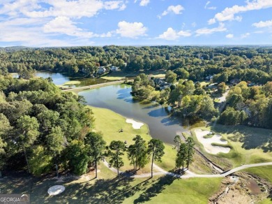 This meticulously renovated 4-sided brick ranch home combines on Royal Lakes Golf and Country Club in Georgia - for sale on GolfHomes.com, golf home, golf lot