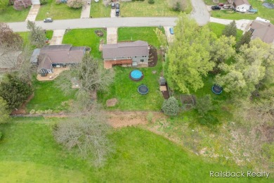 Do not miss this amazing Comstock Park property located on the on Alpine Golf Club in Michigan - for sale on GolfHomes.com, golf home, golf lot