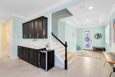 This stunning 5-bed, 5-bath Jones Homes masterpiece with water on Eagle Creek Golf Club in Florida - for sale on GolfHomes.com, golf home, golf lot