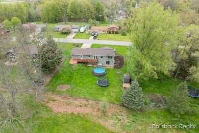 Do not miss this amazing Comstock Park property located on the on Alpine Golf Club in Michigan - for sale on GolfHomes.com, golf home, golf lot