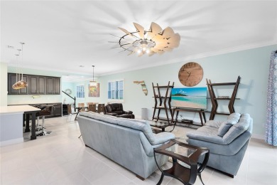 This stunning 5-bed, 5-bath Jones Homes masterpiece with water on Eagle Creek Golf Club in Florida - for sale on GolfHomes.com, golf home, golf lot