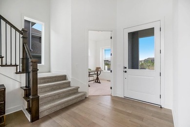 This is a MODEL HOME.  You will want to see this gorgeous brand on Heritage Park Golf Course in Kansas - for sale on GolfHomes.com, golf home, golf lot