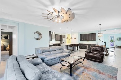 This stunning 5-bed, 5-bath Jones Homes masterpiece with water on Eagle Creek Golf Club in Florida - for sale on GolfHomes.com, golf home, golf lot