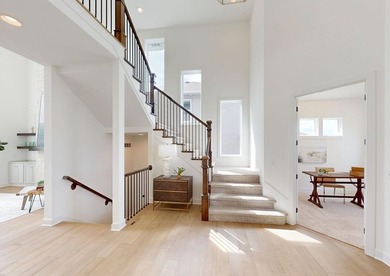 This is a MODEL HOME.  You will want to see this gorgeous brand on Heritage Park Golf Course in Kansas - for sale on GolfHomes.com, golf home, golf lot