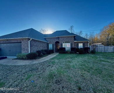 Welcome to your dream home at 990 Clubhouse Drive! in Pearl's on Patrick Farms Golf Club in Mississippi - for sale on GolfHomes.com, golf home, golf lot