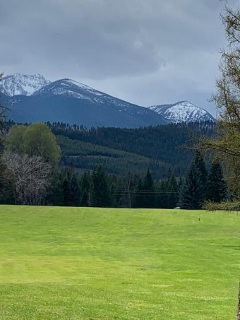 This lot is situated in a small residential golf course on Cabinet View Country Club in Montana - for sale on GolfHomes.com, golf home, golf lot