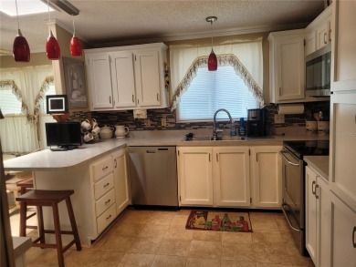 This very well-maintained pet free 3-bedroom 2 bath home in on Zellwood Station Country Club in Florida - for sale on GolfHomes.com, golf home, golf lot