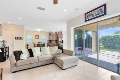 This beautifully maintained Jones Homes residence in the gated on Eagle Creek Golf Club in Florida - for sale on GolfHomes.com, golf home, golf lot