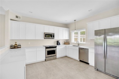 Fabulous Harmony Island and rarely available 3/3 with 2 covered on Oak Harbor Country Club in Florida - for sale on GolfHomes.com, golf home, golf lot