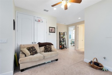 This beautifully maintained Jones Homes residence in the gated on Eagle Creek Golf Club in Florida - for sale on GolfHomes.com, golf home, golf lot