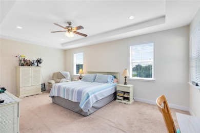 This beautifully maintained Jones Homes residence in the gated on Eagle Creek Golf Club in Florida - for sale on GolfHomes.com, golf home, golf lot